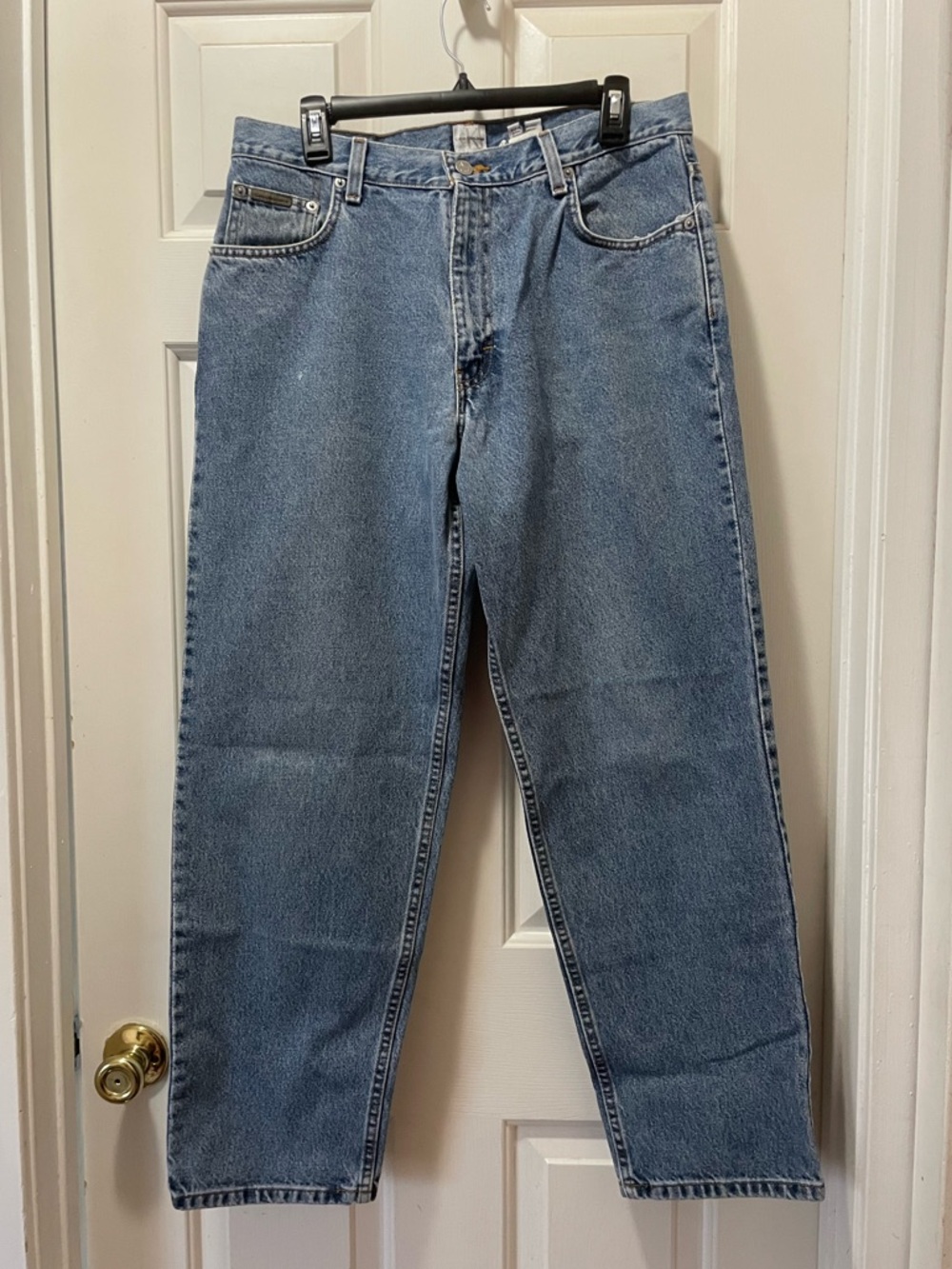 Vintage Men’s Calvin Klein 90s Easy Fit Jeans Light Blue Denim size 34x30